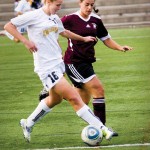 Tigers battling for possession. Photo by Rob Grandy.