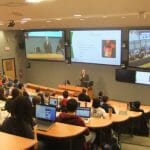At the Dal Medical School, one videoscreen streams the Saint John campus class. Photo by Daniel Boltinsky