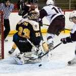 Cory Tanaka scores for the Huskies early in the 3rd in a Jan. 20 game. Photo by Martina Marien