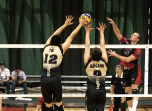 Daniel You and Angus Rhuland leap for the block. Photo by Andrew Meade via the Brunswickan