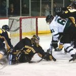 Tigers and Panthers jostle for position in front of Dal goalie Bobby Nadeau Feb. 3. Photo by Martina Marien