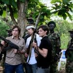The founders of Invisible Children, clearly aware of the serious and complex nature of the conflict. Photo via Invisible Children