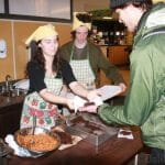 Rebecca Hoffer serves up vegan brownies at a tuesday serving. Photo by Katrina Pyne