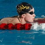 Graduating swimmer Emmalina Corriveau finished eighth in the 200 backstroke. (Photo by David Moll via University of Calgary)