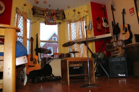 The open mic house is on the edge of existence