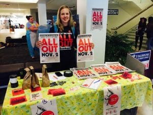 Lisa Odland with the DSU works the information table.