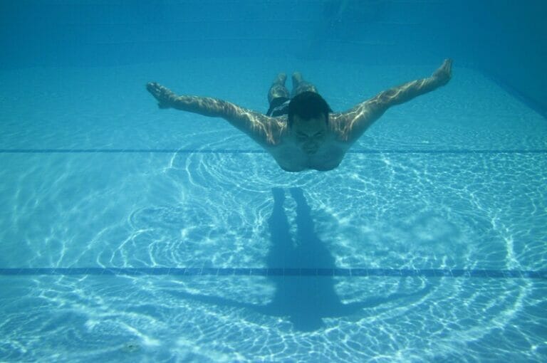 A casual swim can help keep the weight down. Photo by Vera Kratochvil via publicdomainpictures.net