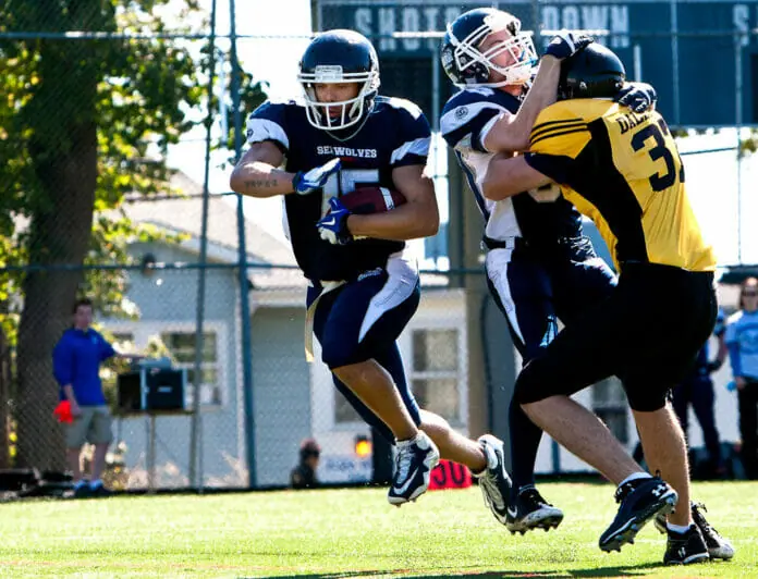 Making a break for it -- photo from this weekend's football game by Martina Marien