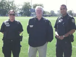 Mike Burns (centre), director of security, and Dalhousie security officers at Wickwire Field. Photo by Kristie-Lynn Smith.