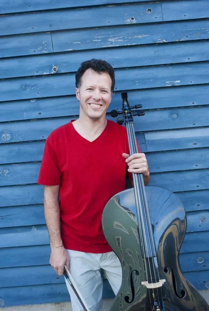 Norman Adams and his cello -- photo by Angela Gzowski