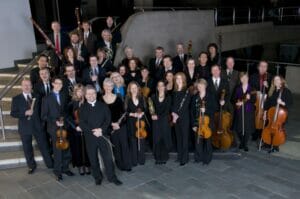 The smiling Symphony Nova Scotia. Photo courtesy www.symphonynovascotia.ca. Photo by Aaron McKenzie Fraser, www.amfraser.com.