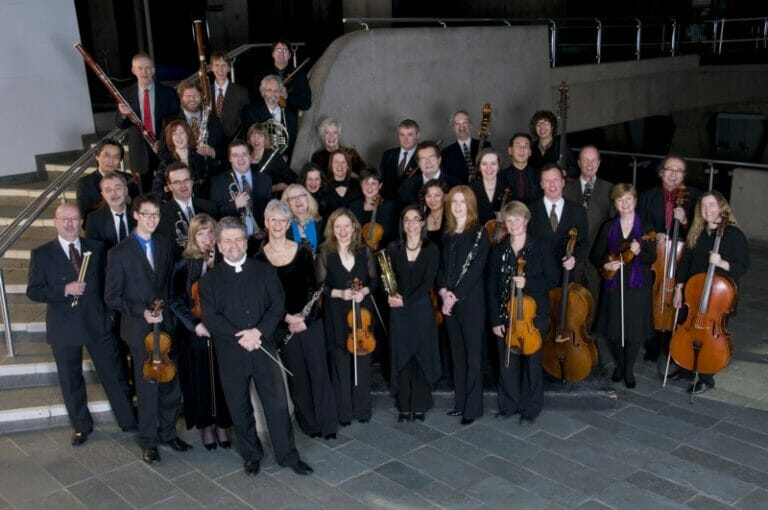 The smiling Symphony Nova Scotia. Photo courtesy www.symphonynovascotia.ca. Photo by Aaron McKenzie Fraser, www.amfraser.com.