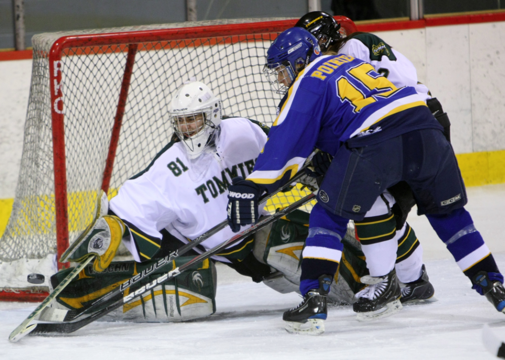 Moncton's Marie-M. Poirier crashes the net. Photo by Dal Athletics.