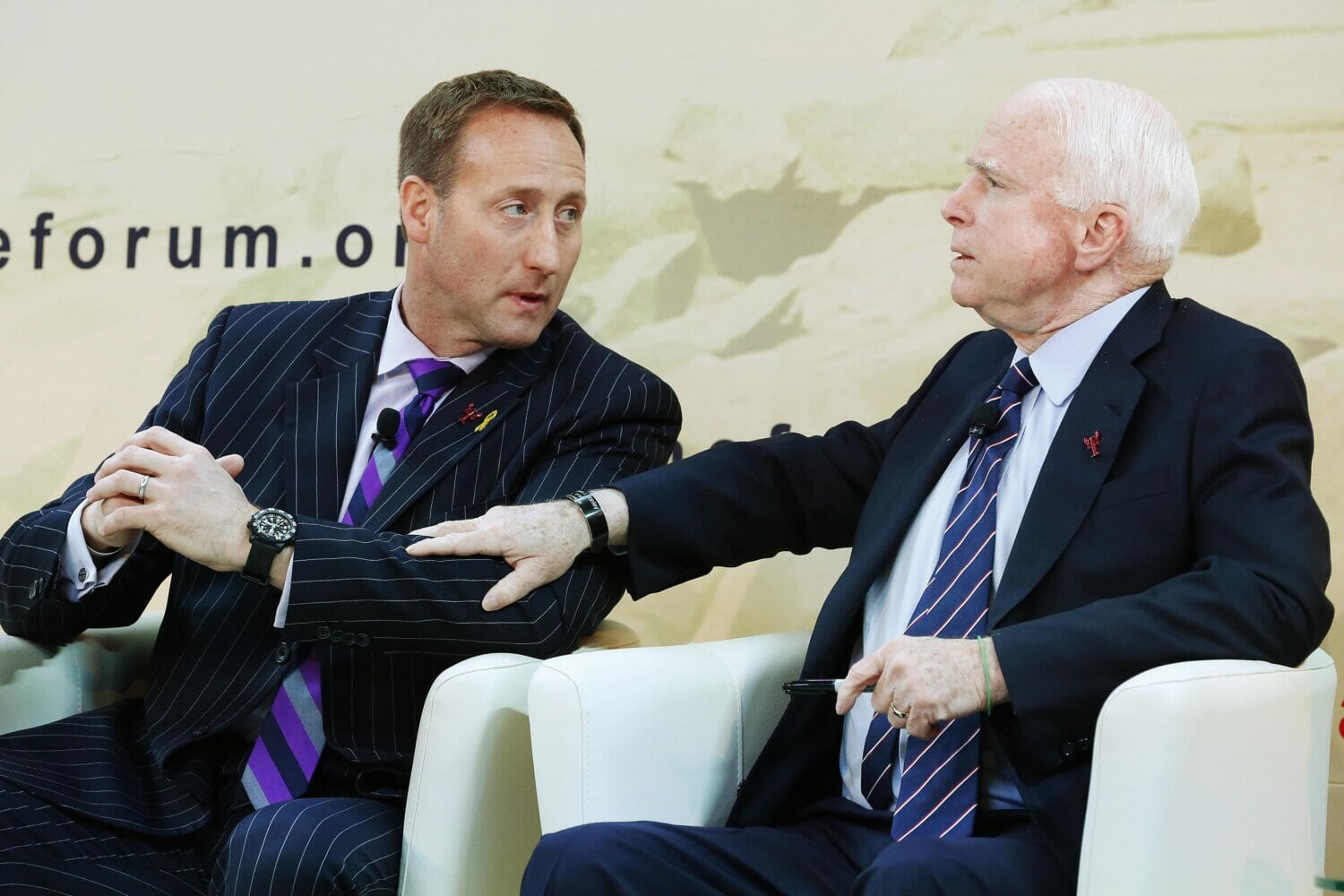 Canadian Minister of National Defence Peter MacKay and US Senator John McCain discuss