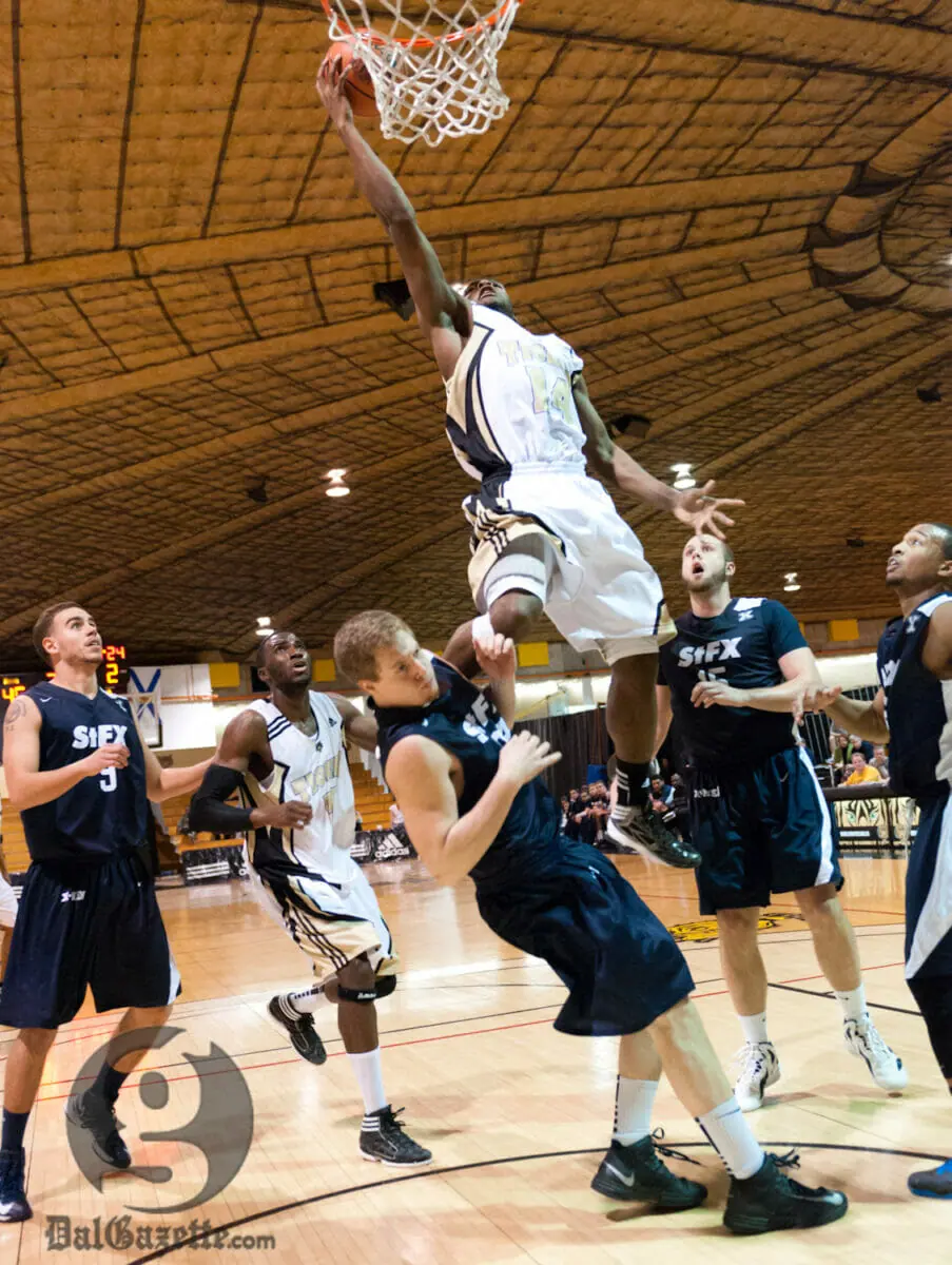 Kashrell Lawrence goes airborne in an authoritative Tigers victory. (Chris Parent photo)