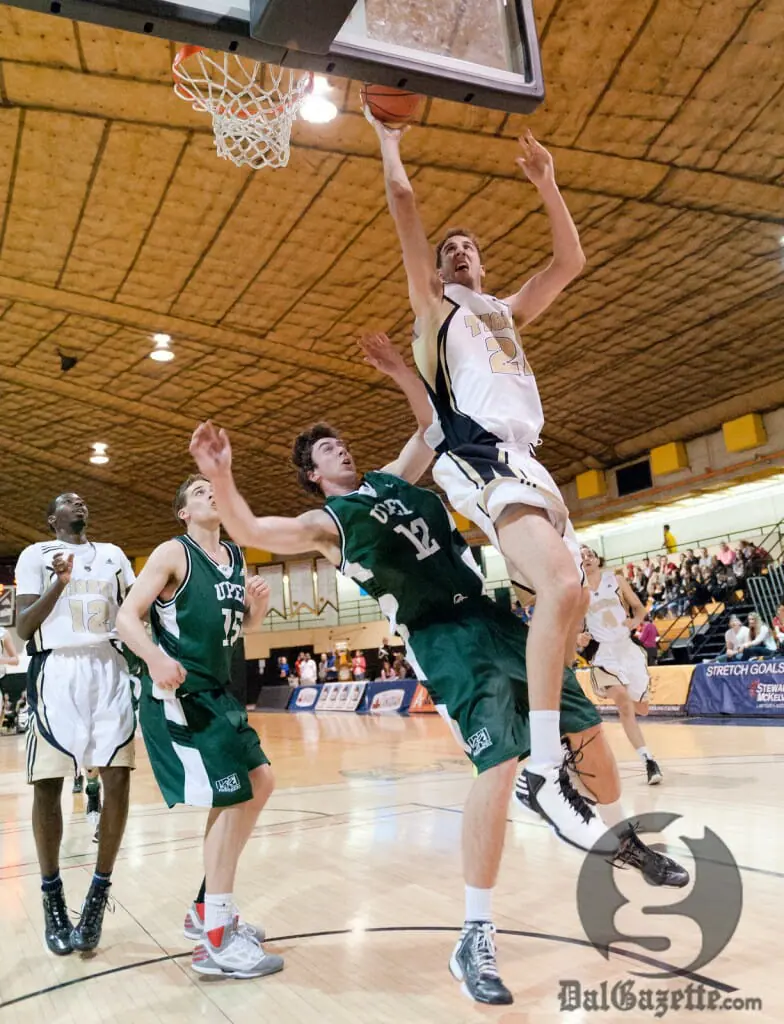 Simon Marr outmuscles his UPEI opponent in Dal's 81-71 victory. (Chris Parent photo)