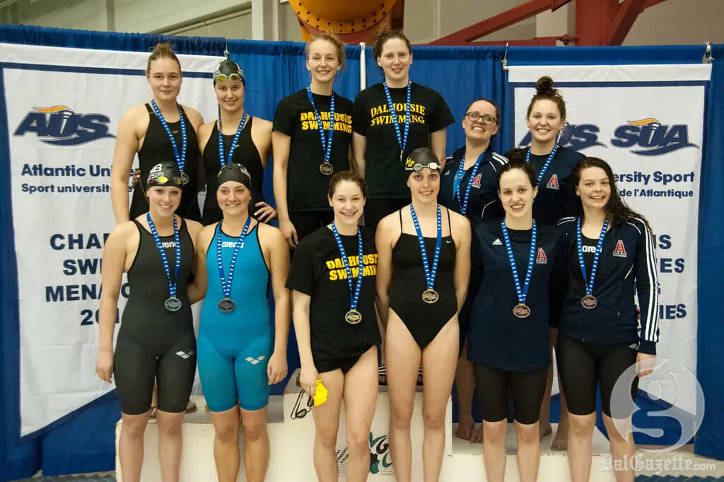 Dal won gold in the 4x100 metre freestyle relay. Middle four, clockwise from top left, Mary Claire Lynch, Michelle Campbell, Ceilidh MacPherson, Molly Wedge. (Photo by Shelley Ebbett via UPEI Athletics)