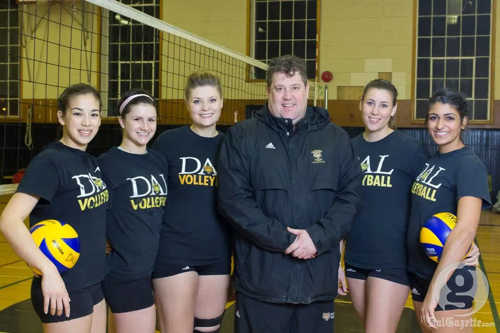 Dal volleyball stars, from left, Hilary Sears, Tara-Lynn Truant, Maggie Powers, coach Rick Scott, Louise Facca and Raeesa Lalani. (David Munro photo)