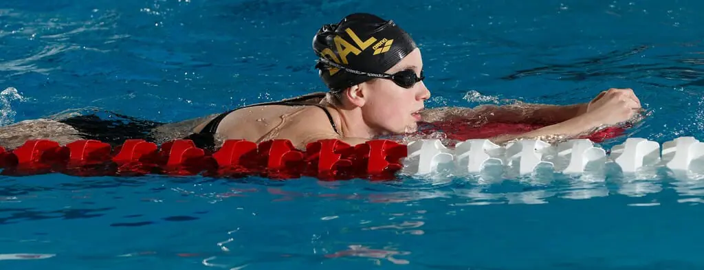 Graduating swimmer Emmalina Corriveau finished eighth in the 200 backstroke. (Photo by David Moll via University of Calgary)
