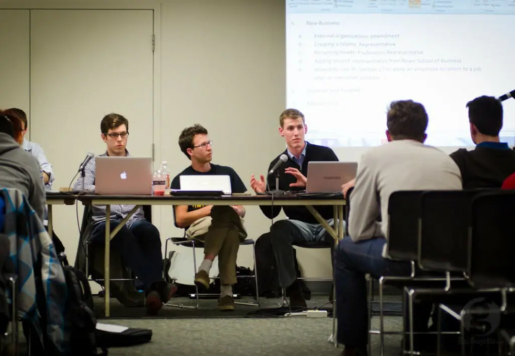 Ben Wedge, Jamie Arron and Aaron Wolfe take questions at the DSU AGM. (Calum Agnew photo)