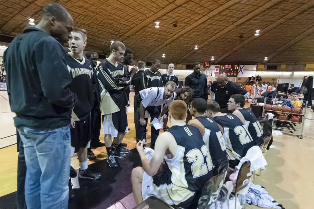 Tigers men's basketball coach John Campbell, in white, is leaving Dalhousie. (Chris Parent photo)