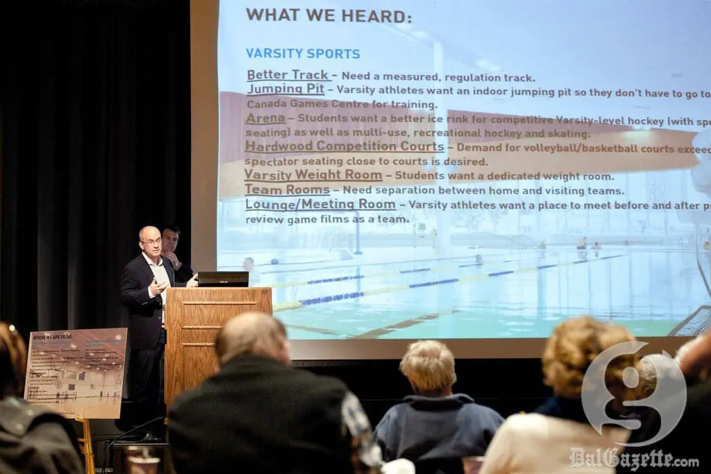 Oliver Beck of Educational Consulting Services speaks to the gathered audience. (Chris Parent photo)
