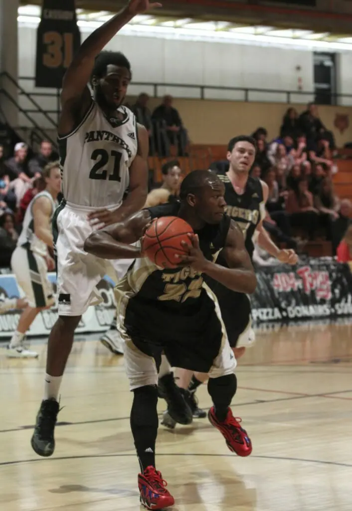 Kashrell Lawrence (22) looks for an opening against the high-flying Panthers. (Photo by Shauna Brown)
