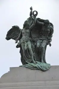 Two allegorical statues of freedom standing atop the National War Memorial. (photo by Kienan Webb)