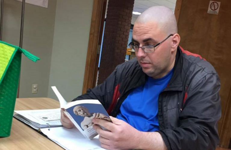 Halifax Humanities 101 student Tim Blades reads Plato’s Republic before class.