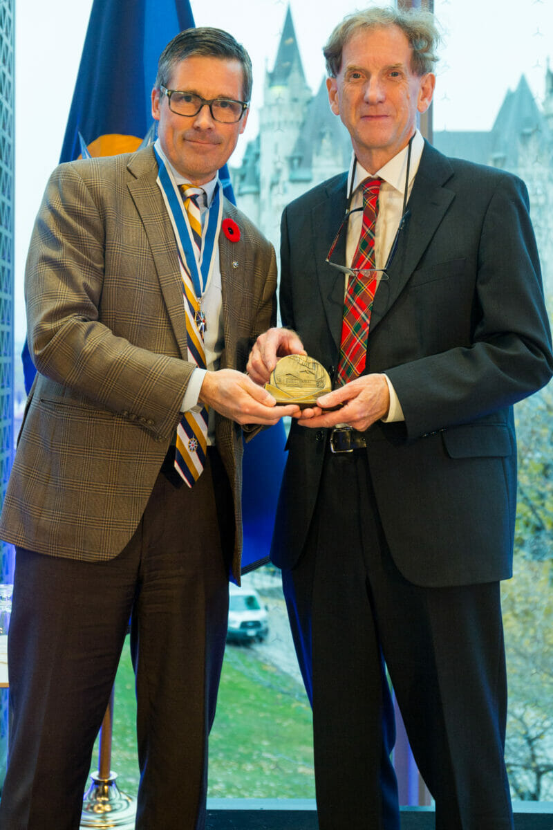 Dr. Drummon receives an award.