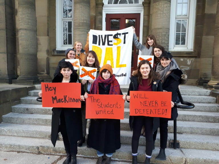 In this image: Students supporting Divest Dal at the Board of Governor's meeting.