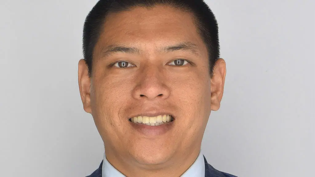 In this image: a portrait of Andrew Ling.