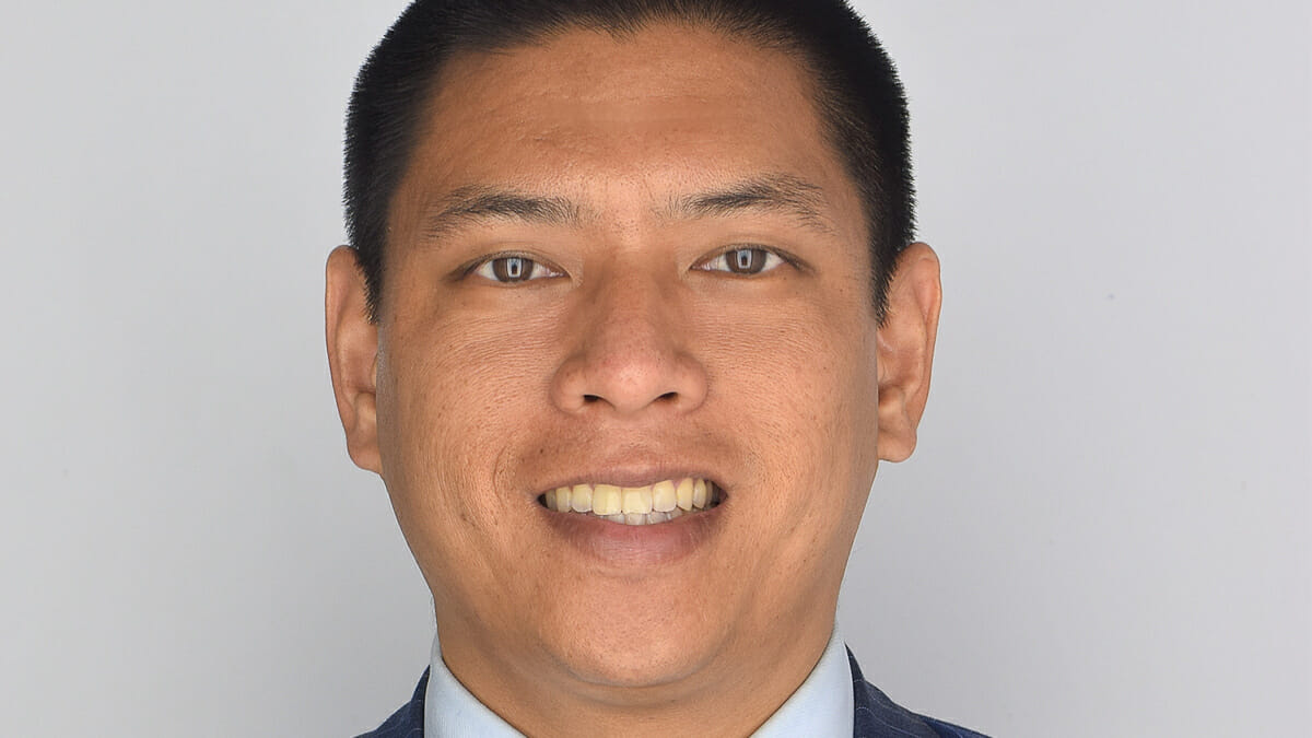 In this image: a portrait of Andrew Ling.