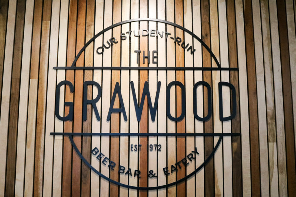 In this image: The Grawood's sign.