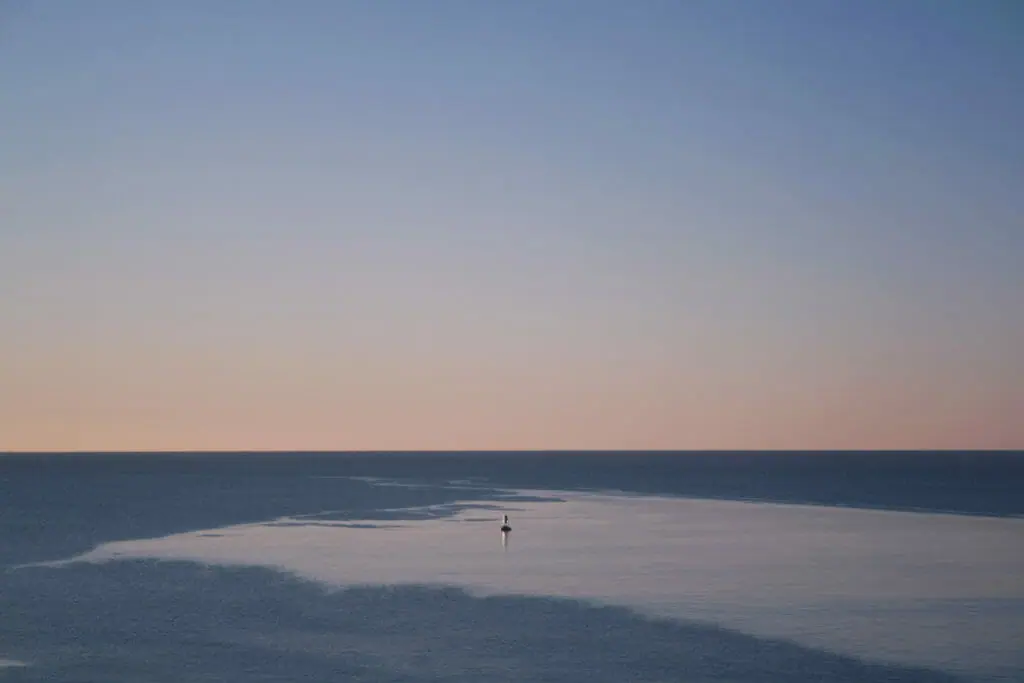 In this image: A sunset over Herring Cove.
