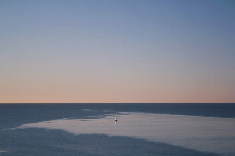 In this image: A sunset over Herring Cove.