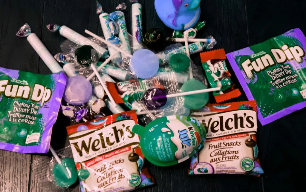 In this image: A pile of Halloween candy.