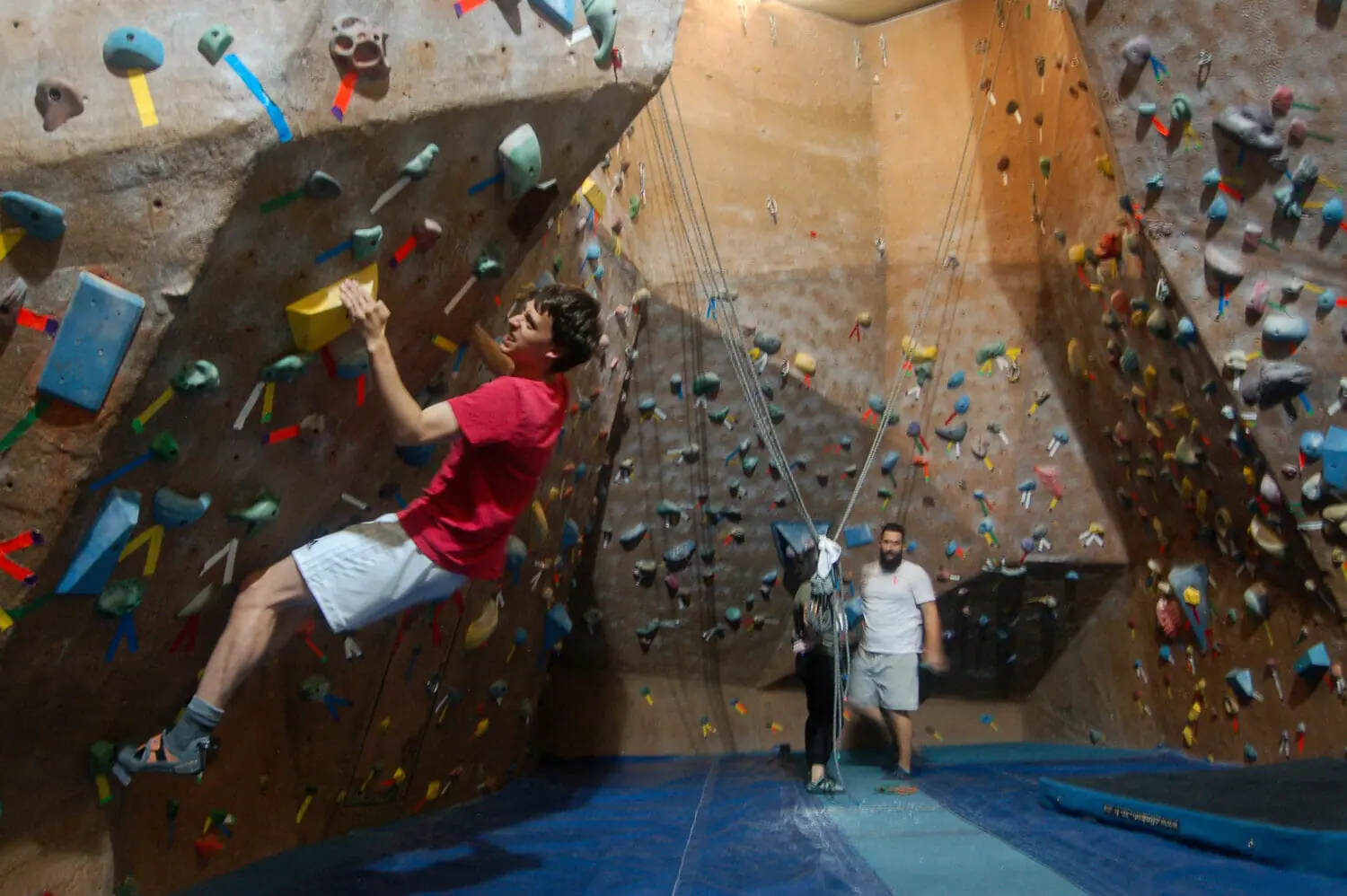 In this image: James Wise climbs a bouldering wall at the Dalplex.
