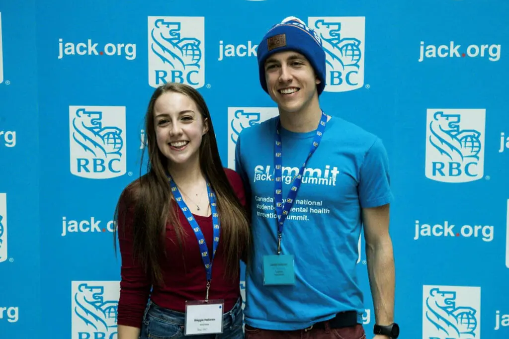 In this image: Jacob and Maggie Halloran pose for photos.