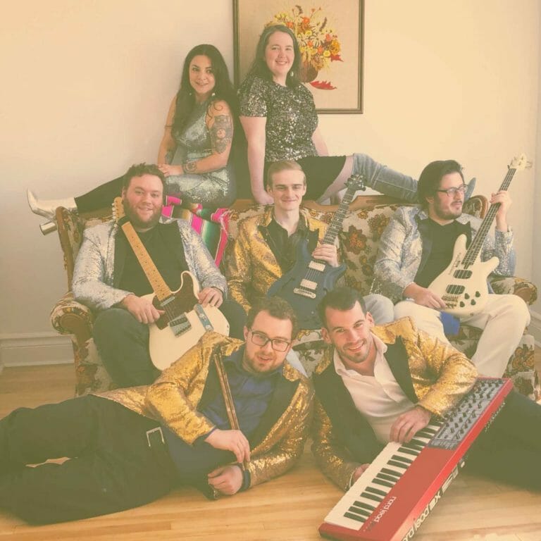 In this image: The band members of the ABBA cover band.