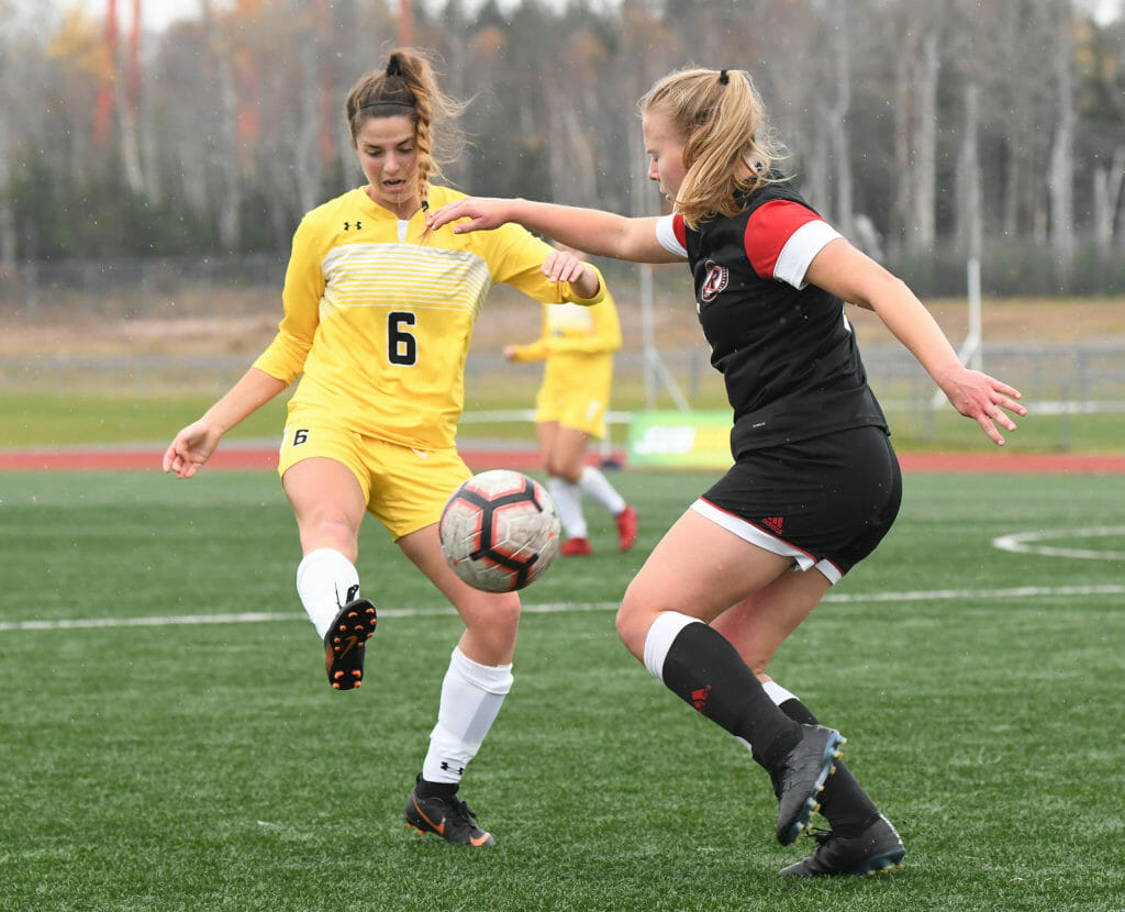 In this image: Two players during the Dalhousie versus University of New Brunswick game on Oct. 31.