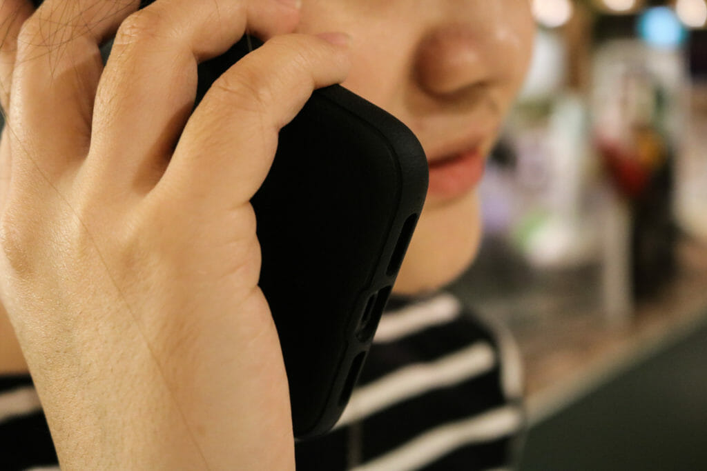 In this image: A photo illustration of a woman talking on a cellphone.