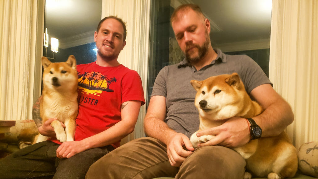 In this image: Owners Matt Havenga and Daniel Smith with their dogs Odin and Nomi.