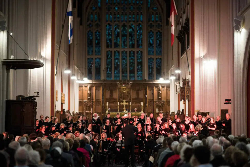 In this image: King's Chorus performing at St. Mary's Basilica.