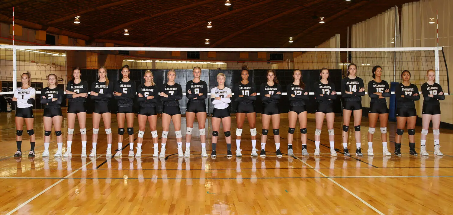 In this image: The Dalhousie Tigers women's volleyball team.