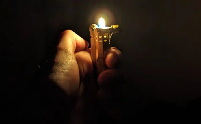 A small flame reaches from the edges of a lighter. Aaron Bushnell never had to die, and neither does anybody else.