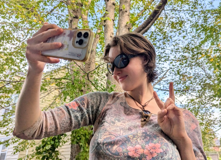 A girl takes a selfie outdoors in Halifax, Nova Scotia, on Wednesday, Sept. 24, 2025. (Rachel Bass/Dal Gazette)