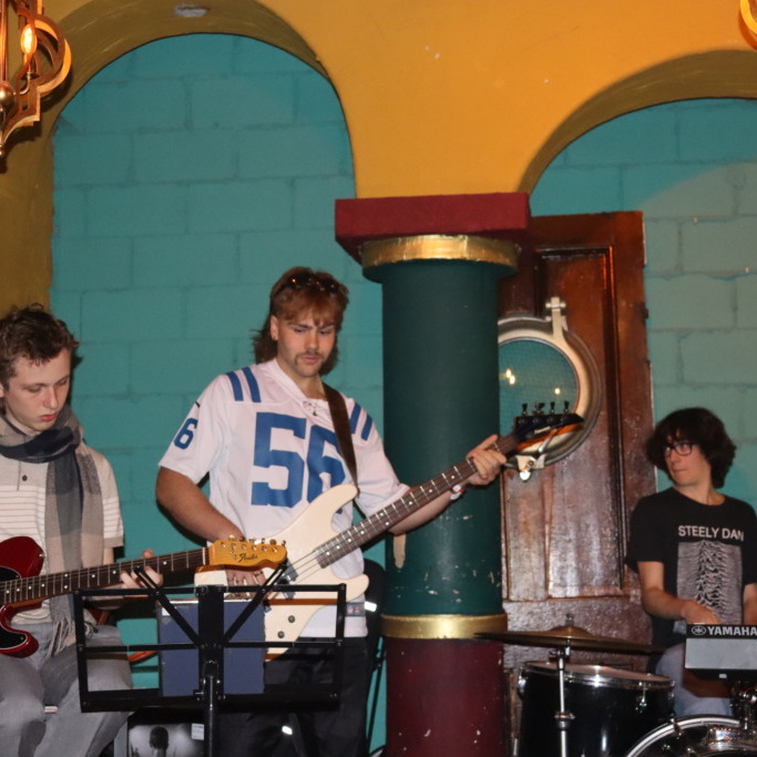 0A05135F-EEA9-47C1-B644-AF6CCC133F4A Leo Cox, Dante Kierstead, and Ben Tucker performing at  the Basement of the Economy Shoe Shop on Oct. 21. (Mariana Luz/ The Dalhousie Gazette)
