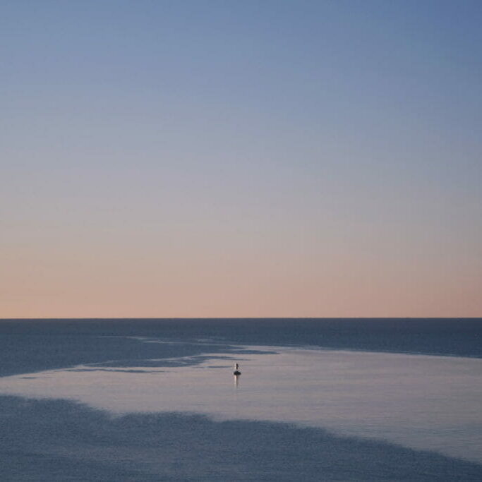 In this image: A sunset over Herring Cove.