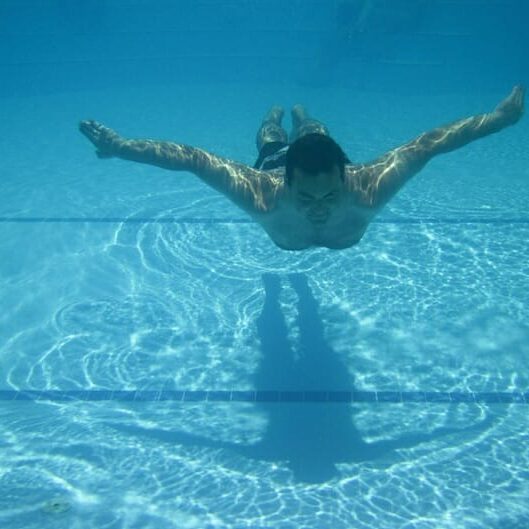 A casual swim can help keep the weight down. Photo by Vera Kratochvil via publicdomainpictures.net
